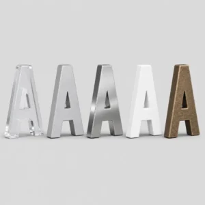 Side by side comparison of acrylic, aluminum, stainless steel, PVC, and cast metal dimensional letters